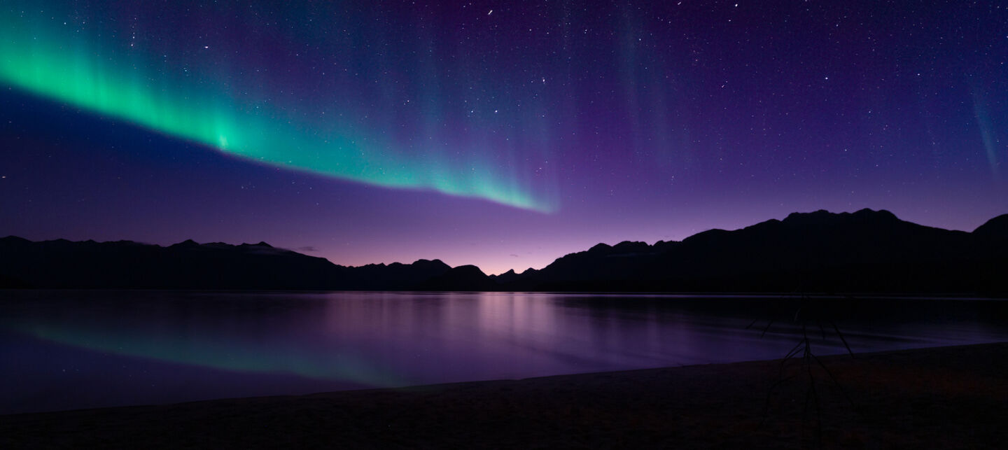 Auroras over a lake.