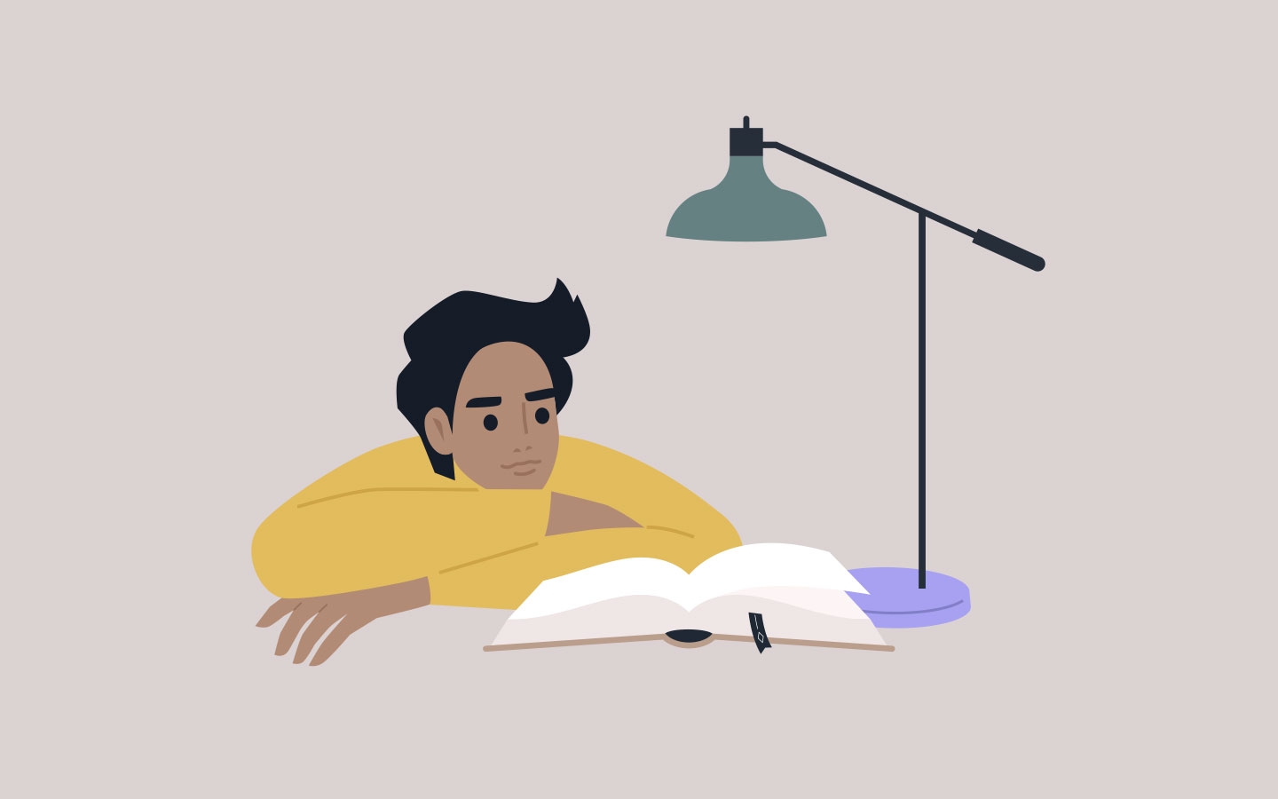 Man doing research reading a dictionary or glossary of terms.